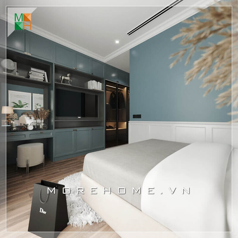 Thiết kế tủ đồ màu xanh lam kết hợp kệ tv phòng ngủ chung cư, nhà phố rất đẹp và tiện nghi, màu sắc cá tính và nổi bật. Thiết kế kệ để đồ âm tường cạnh giường ngủ rất tiện lợi tối giản diện tích căn phòng, giúp căn phòng ngủ trở nên rộng và tiện nghi hơn. Thiết kế phòng ngủ nhà phố